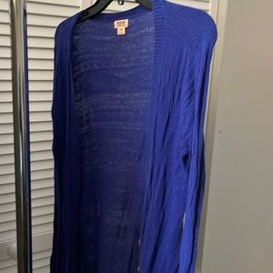 Deep blue/purple sweater.